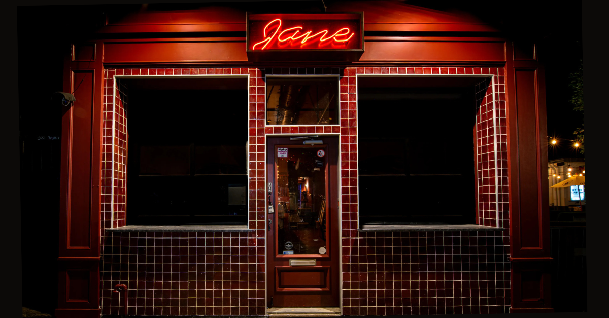 Jane cocktail bar exterior at night, NuLu Louisville